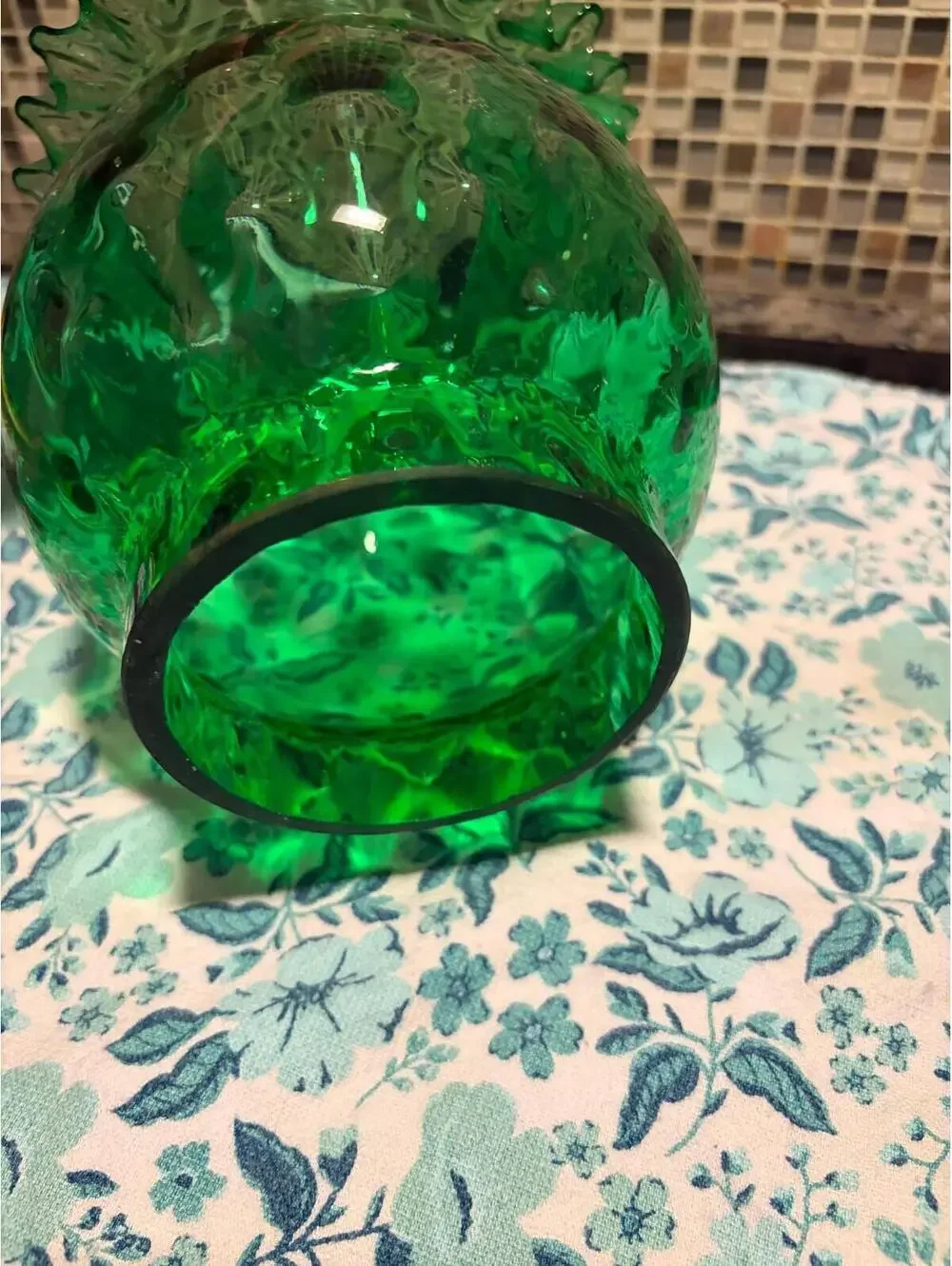 This is a vintage emerald green coin dot art glass vase by Fenton.